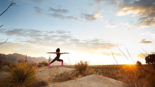person doing yoga outside